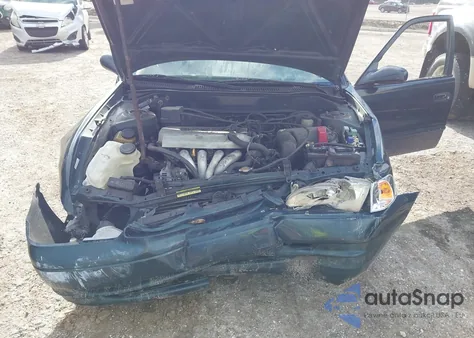 1999 Toyota Corolla Le z USA, uszkodzony, nr VIN 1NXBR12E5XZ201923